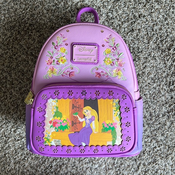 Loungefly Bags Tangled Loungefly Princess Stories Backpack Poshmark